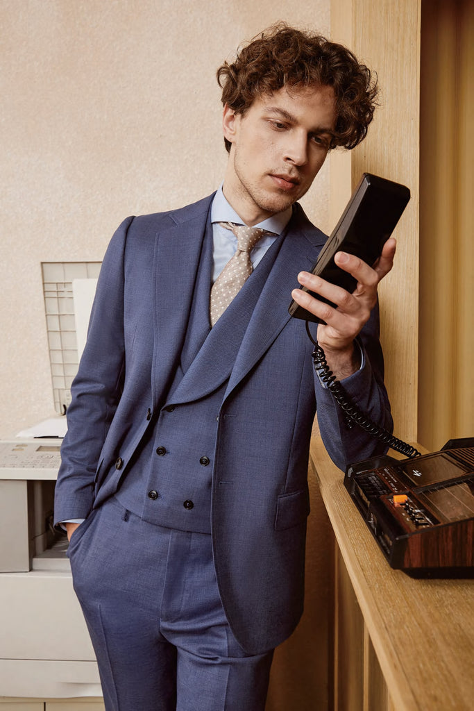 Sophisticated Navy Three-Piece Wool Suit